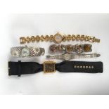 A stainless steel Seiko quartz bracelet watch (ladies) and four fashion ladies watches including