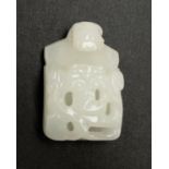 A Chinese pale jade coloured glass belt hook, archaistic style, fret carved, dragon head hook,