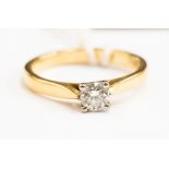 A diamond solitaire ring, claw set in 18ct gold, diamond weight approx 0.