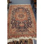 A Turkish Kayseri hand knotted wool-on-cotton rug/carpet with stylised symmetrical floral