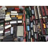 Two boxes of assorted rolling stock, coaches and other OO gauge model railway.