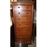 A Victorian mahogany Wellington chest, comprising seven drawers, retaining original turned handles,