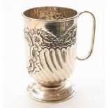 A Victorian silver Christening cup, wyvern fluted body beneath band of chased foliage, Birmingham,