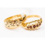 Two circa 1900 18ct gold stone set rings,