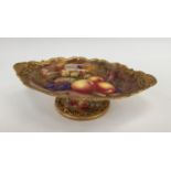 A Royal Worcester oval pedestal dish, painted with fruit, signed Price.