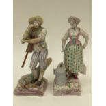 A pair of faience figures of gardeners, tin glazed earthenware, Meissen marks,