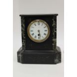 Black marble mantle clock with enamelled dial and Roman numerals (1)