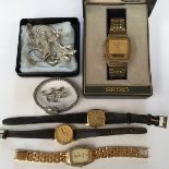 A collection of silver jewellery and watches to include a silver brooches,