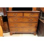 A George III mahogany chest of drawers, fitted with two short over three long graduated drawers,