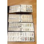 Eight albums of cigarette cards and two boxes