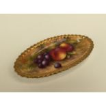 A Royal Worcester oval dish, painted with fruit, signed E.