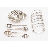 A George V silver six section toast rack, Birmingham,