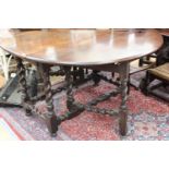 A late 17th / early 18th Century oak gateleg table, the central bed with a single drawer,