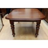 Early Victorian mahogany wind out dining table with two later leaves