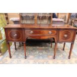 A George III style mahogany serpentine fronted sideboard,