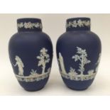 A pair of Adams dark blue dip vases,