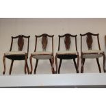 A set of four Edwardian mahogany inlaid parlour chairs