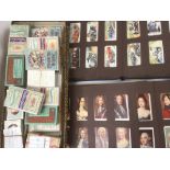 A large selection of cigarette cards, early 20th Century in sets and three part sets,