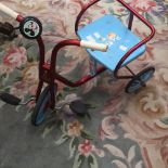 A child's Raleigh three wheel tricycle