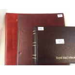 Three stamp albums to include a very large quantity of mint QE2 blocks