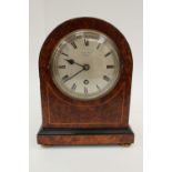 An early 20th Century burr veneered eight day mantle clock, by Birch and Gaydon Ltd,