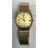 A 9ct gold cased Accurist gentleman's watch with date window and baton dial, circa 1960s,