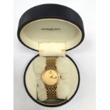 A Raymond Weil gents watch gold plated with crystal dial original box and paperwork