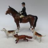 A Beswick Huntswoman on a bay horse, model No.