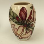 A Moorcroft trumpet flower vase, cream ground,