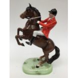 A Beswick Huntsman on rearing horse, model No.