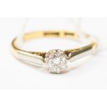 A diamond solitaire, in 18ct gold and platinum setting,