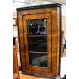 An 18th Century walnut veneered hanging corner cupboard,