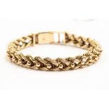 A 9ct woven link bracelet, with ball details to the centre, length approx 7.