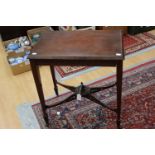 A late Victorian rosewood occasional table, of rectangular form blind fretwork frieze,
