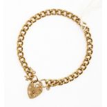 A 9ct gold charm bracelet with padlock fastener, with various 9ct gold and yellow metal charms,