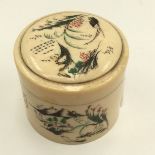 A Chinese Republic period turned and carved ivory lidded canister, of circular form,