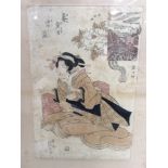 A Japanese woodblock print, coloured, kneeling woman with busy town scene to upper right, signed ,