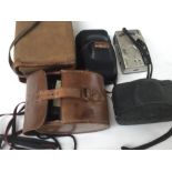 A quantity of various cameras, including Canon Automatic, Nikon AF24OSV, Olympus Trip 35, with case,
