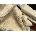 Five sheepskin rugs