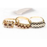 A group of three 9ct gold stone set dress rings,