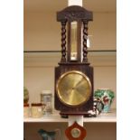 An early 20th Century oak barometer and thermometer by H Miller Optician
