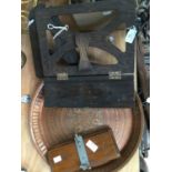 A 1920s book rest, a tie press,