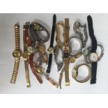 Three mechanical wind ladies watches together with approx 20 quartz ladies watches,