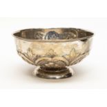 A late Victorian silver circular rose bowl, chased with anthemions and scrolls, London 1898, 7.