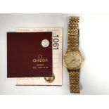 A gents gold plated Omega Seamaster wristwatch with bracelet strap and original document