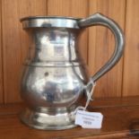 A pewter LMS holds quart measure, made by Harry Mason,