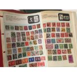 Stamps: Mid-20th century worldwide collection in album,