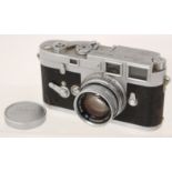 Leica: A Leica M3 camera body, serial number 857435,