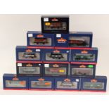 Bachmann: A box of assorted wagons comprising, 33-825G, 37-064 (2), 37-256, 37,426, 38-095B, 37-062,