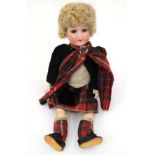 Armand Marseille: A bisque head German doll, open and close eyes, open mouth revealing four teeth,